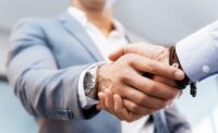 Handshake of businessmen greeting each other