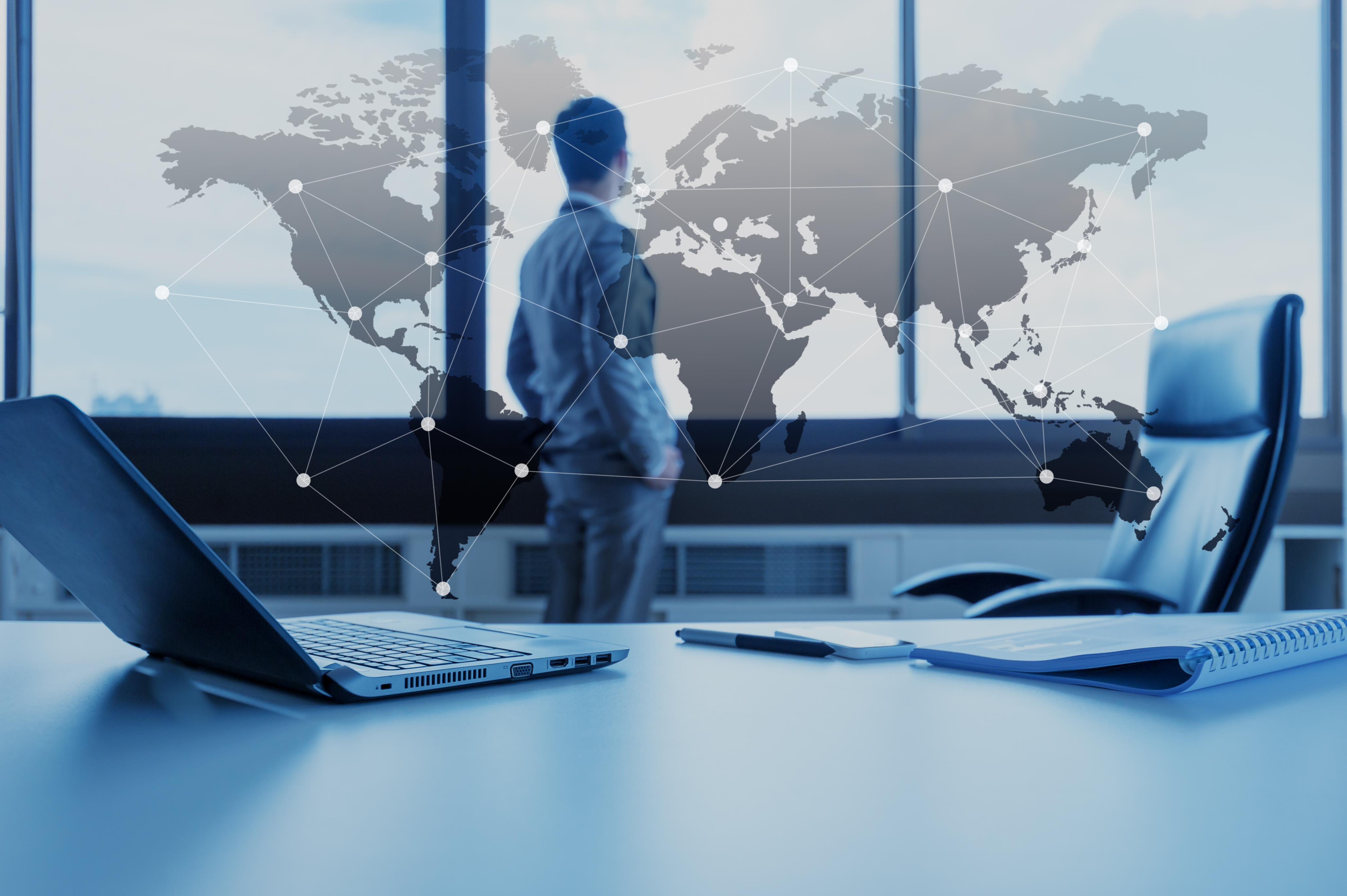 work desk of businessman with laptop, globalization business concept