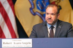 Commissioner of the New Jersey Department of Labor Robert Asaro-Angelo joins Gov. Phil Murphy at his daily COVID-19 press briefing in Trenton on May 7, 2020.