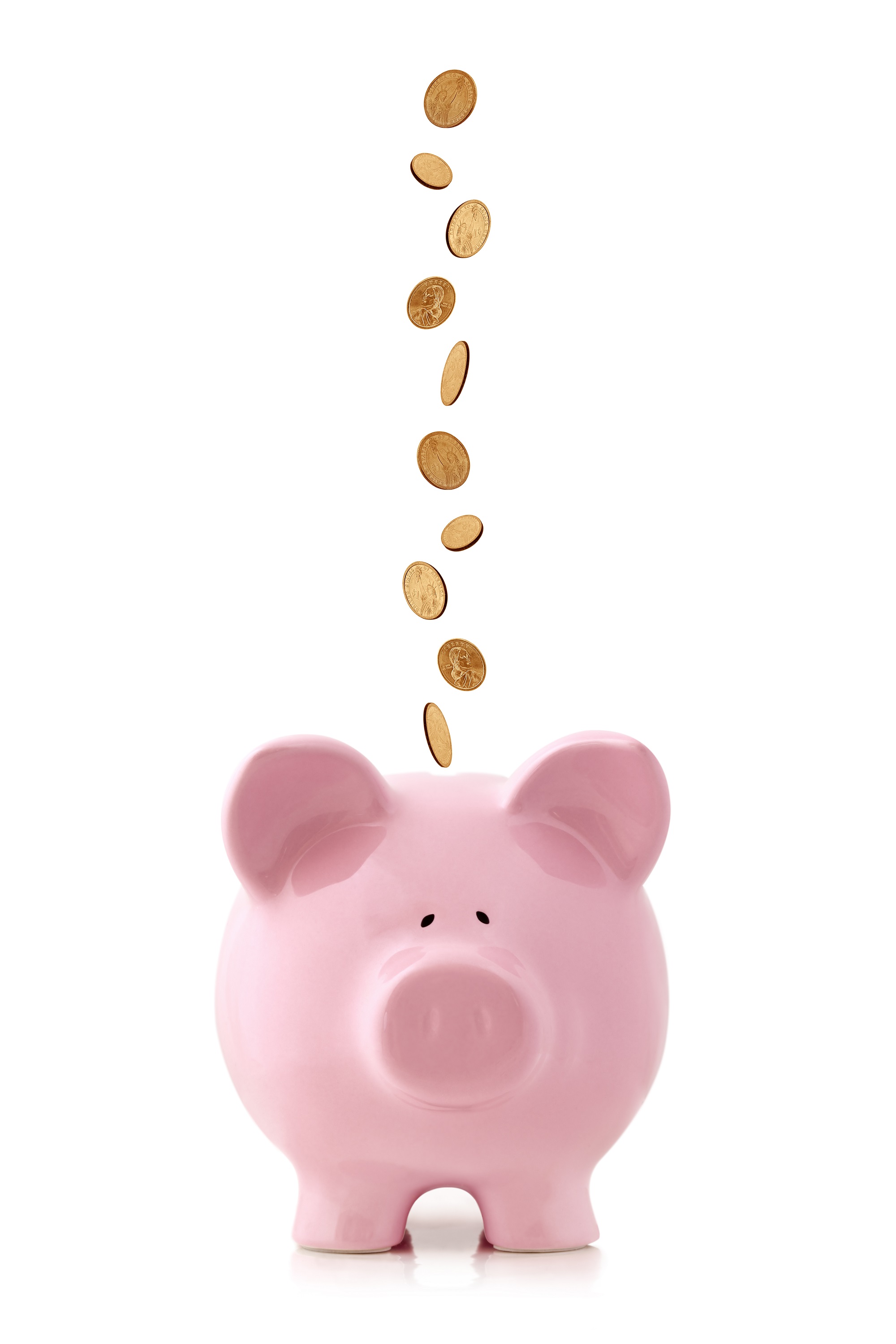 Golden coins falling into a pink piggy bank, isolated on white. US dollar coins