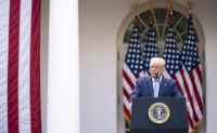 President Donald Trump listens as Vice President Mike Pence addresses his remarks during an update on the nation’s COVID-19 Coronavirus testing strategy Monday, Sept. 28, 2020, in the Rose Garden of the White House