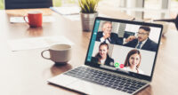 Video call business people meeting on virtual workplace or remote office. Telework conference call using smart video technology to communicate colleague in professional corporate business.