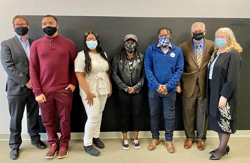 Hopeworks celebrated the grand opening of its new coworking space on April 1, 2021. From left, Dan Rhoton, executive director of Hopeworks; Corey Thorpe, alum and alumni coordinator at Hopeworks; Kayondra Garrison, alumna of Hopeworks; Sekinah Brodie, alumna and Hopeworks Content creator; Chris Church, intern; and Bob and Mindy Cohen of the Burton and Mindy Cohen Foundation. - HOPEWORKS