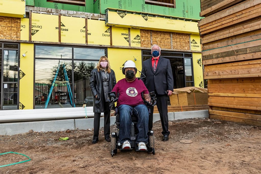 Eric LeGrand at the future site of his Coffee House with Woodbridge Mayor John McCormac and Redevelopment Agency Executive Director Caroline Ehrlich. -JEFFREY AUGER