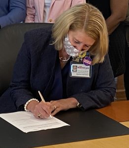 AtlantiCare President and CEO Lori Herndon signs the CEO Action for Diversity & Inclusion's CEO Pledge on May 27, 2021.