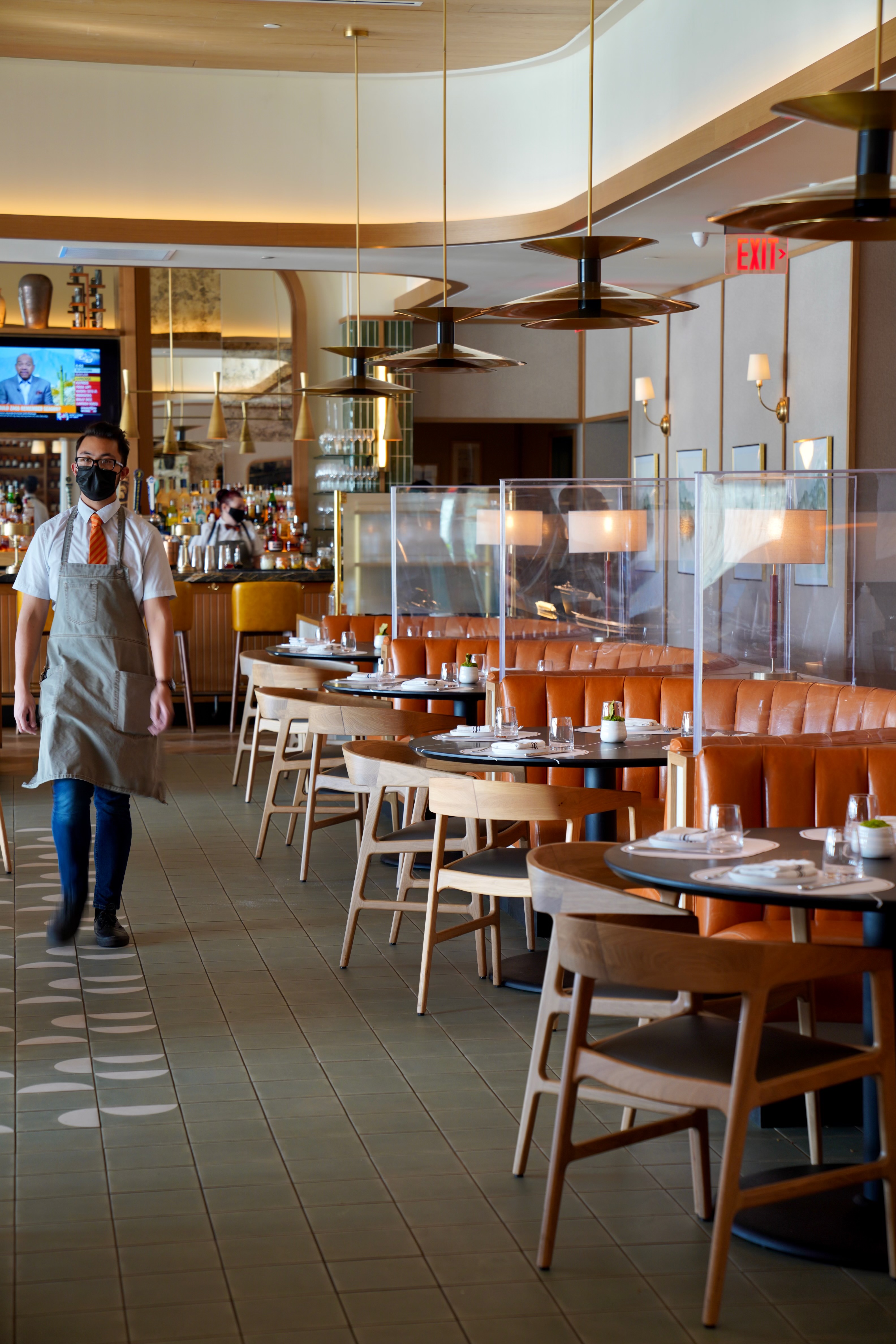 COVID-safe plexiglass seating is available indoors. Restrictions may be lifted, but the protocols will remain in place. - LT BAR & GRILL