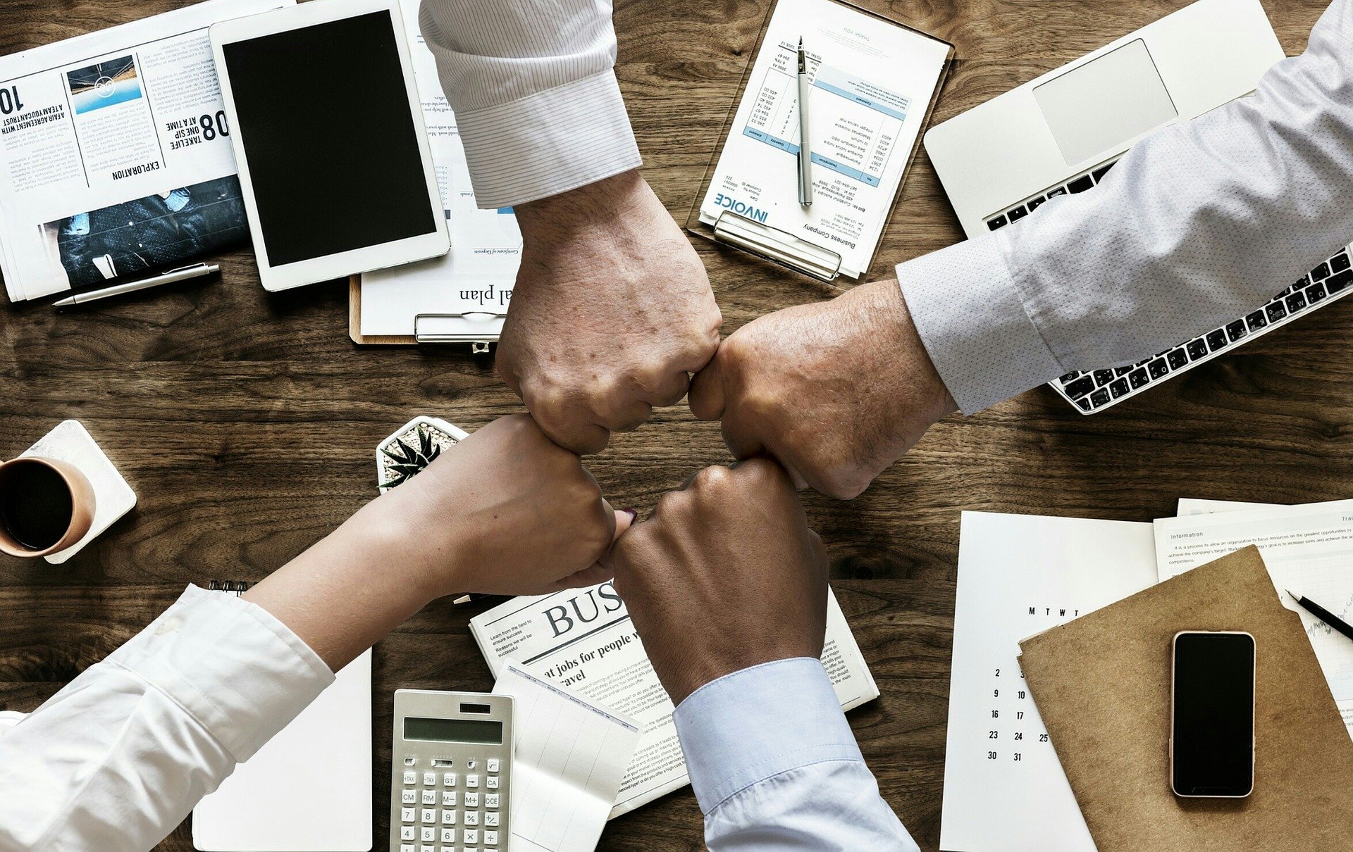 Team of coworkers collaborates at the workplace.