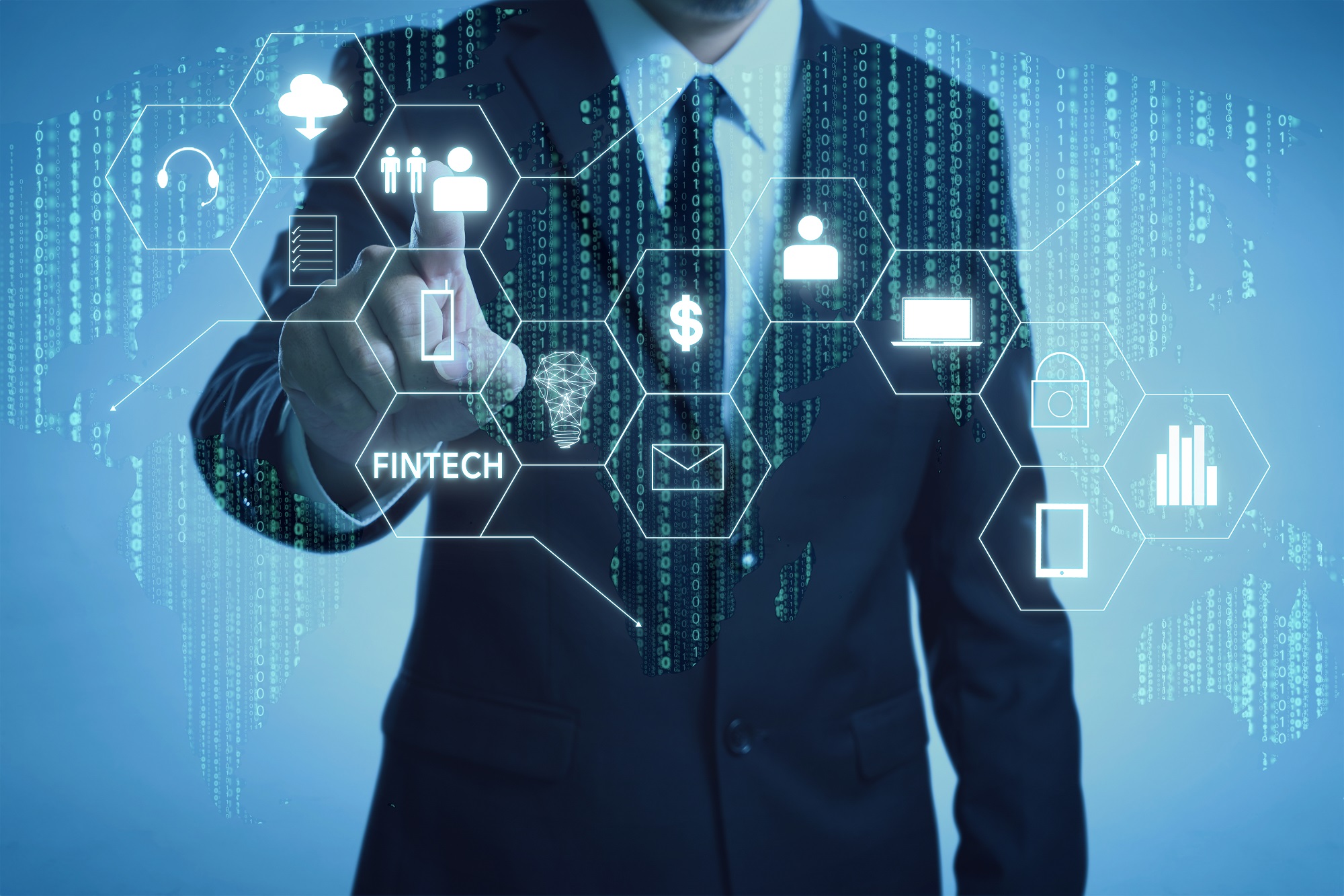 Businessman with fintech icon and internet of things with matrix code background , Investment and financial internet technology concept.