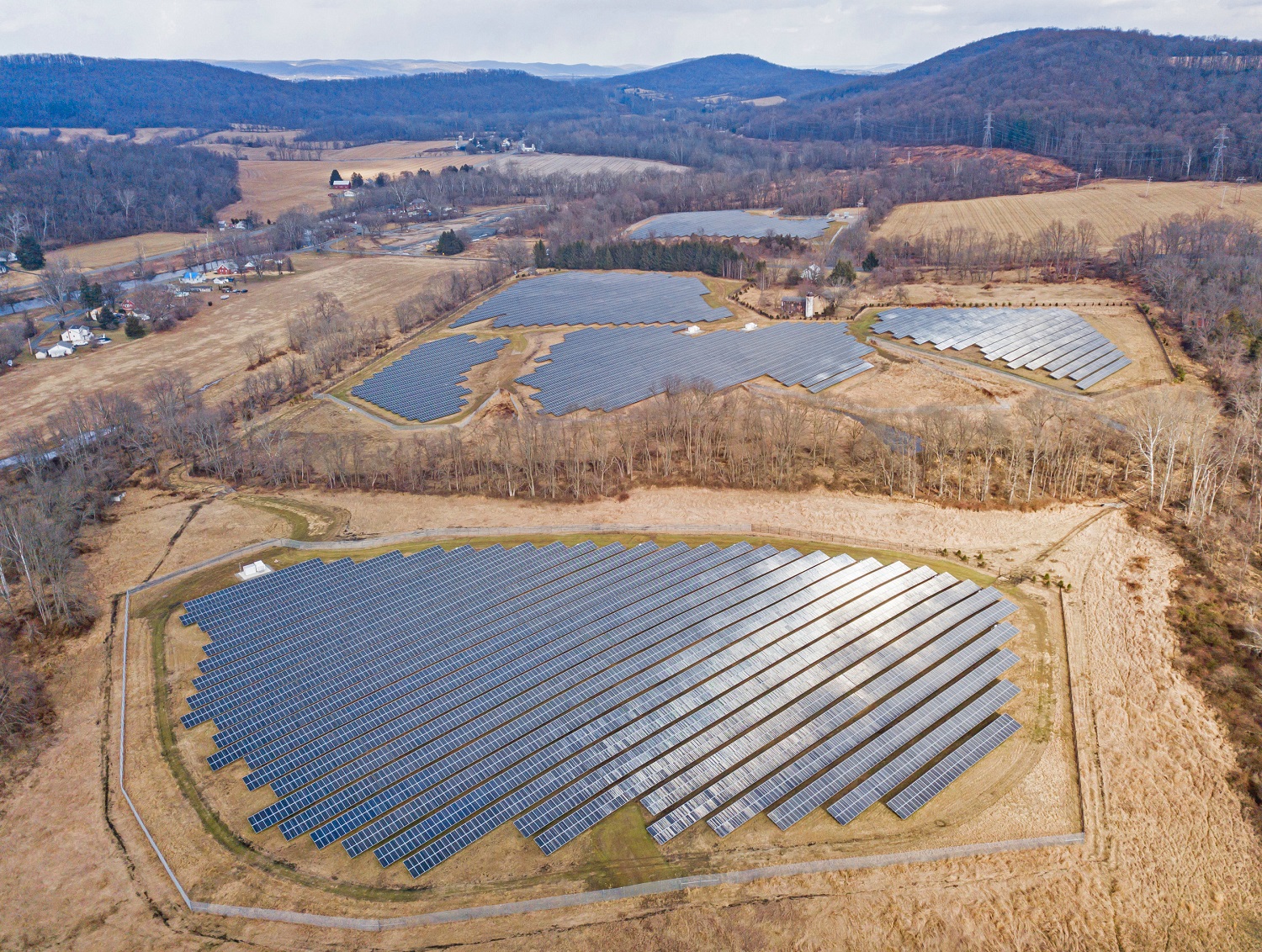 The 8-megawatt Milford Solar Project was the first clean power plant constructed on the abandoned mill site in Milford. - PRNEWSWIRE