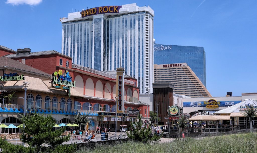 Atlantic City boardwalk with several casinos in the foreground.