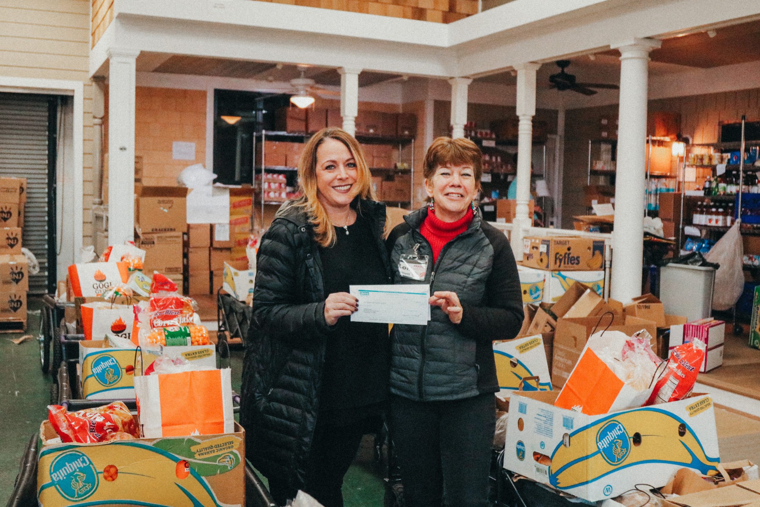 Unity Bank and its employees have donated $34,200 to 19 food pantries in New Jersey and Lehigh Valley, Pennsylvania, including Feeding Hands of Bridgewater. From left, Unity Bank Area Manager Wendy Ewen presents a $1,800 donation to Feeding Hands Executive Director and Founder Lois Bennett.