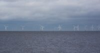 Offshore wind turbines or windmills.