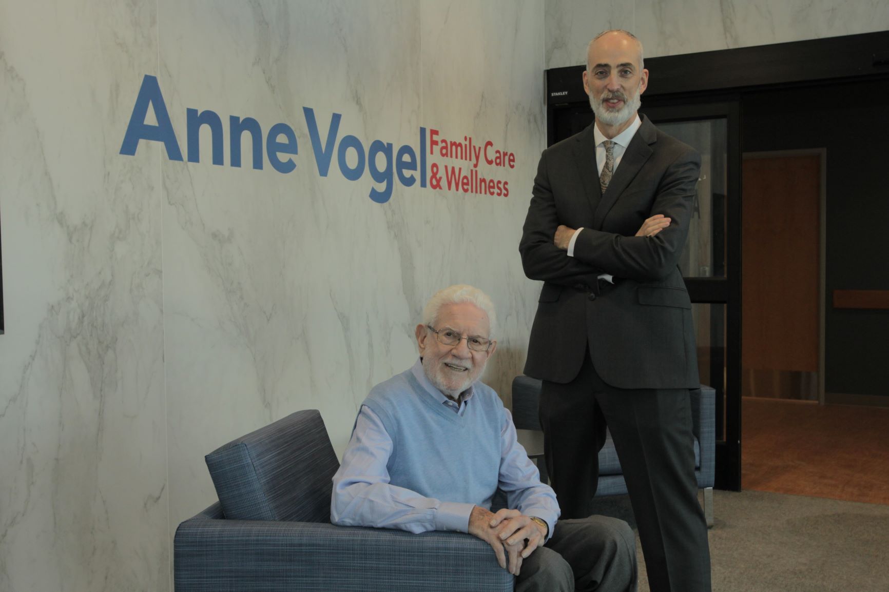 Monmouth Medical Center and Monmouth Medical Center Southern Campus President and CEO Eric Carney, right, and Sheldon Vogel gather in the entrance foyer to the Anne Vogel Family Care and Wellness Center in Eatontown. Vogel gave a $10 million naming gift to the facility that was announced in February 2022.