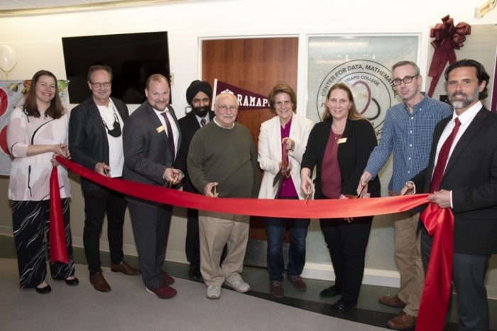 Ramapo College officials cut the ribbon for the new Center for Data, Mathematical, and Computational Sciences on April 27, 2022, at the Mahwah campus.