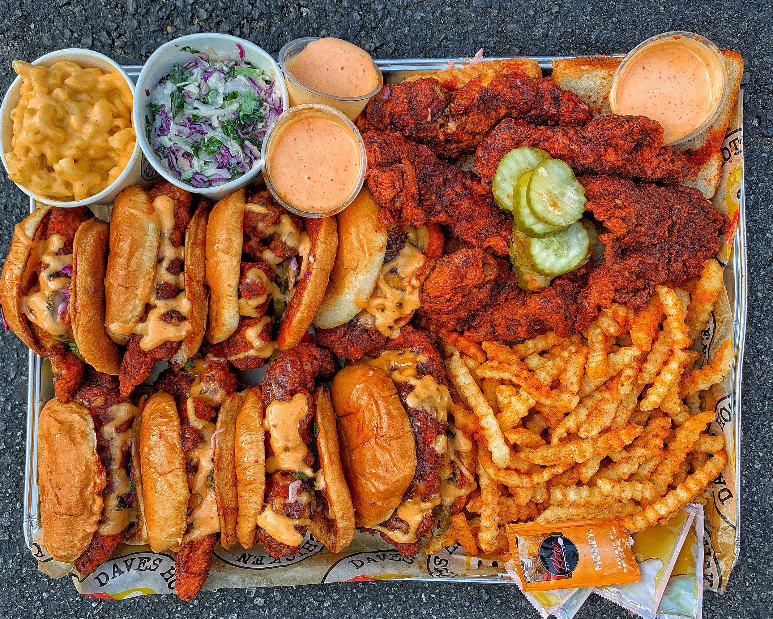 Dave's Hot Chicken and all the fixings: The fast-casual brand's menu includes hot chicken tenders and sliders, house-made kale slaw, mac & cheese and crispy fries or cheese fries.