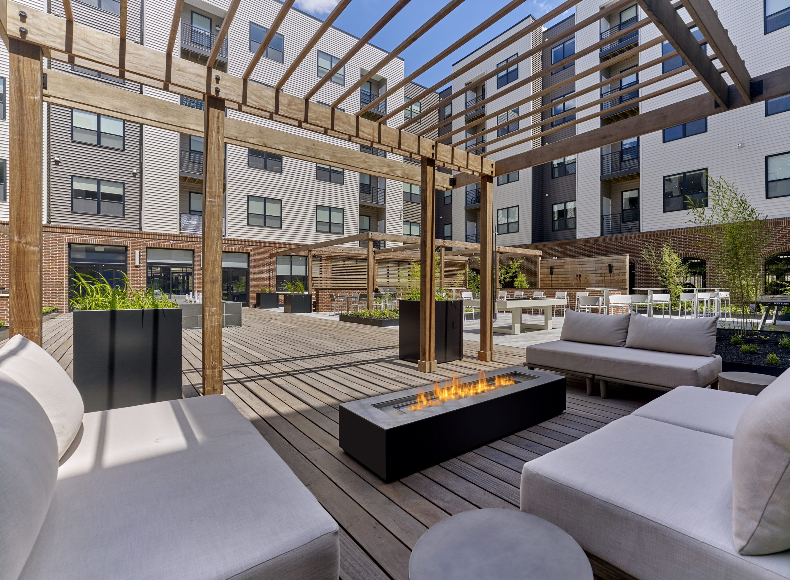 The courtyard and firepit at Citizen Linden from Accurate.