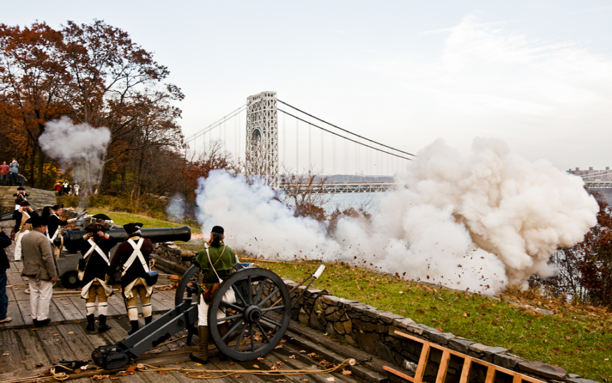 An American Revolution re-enactment takes place in front of the George Washington Bridge at Fort Lee Historic Park.