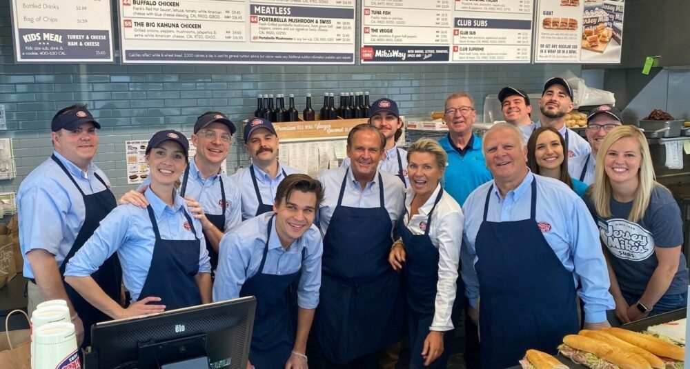 Jersey Mike's founder Peter Cancro (center) celebrates the 2023 Day of Giving with local charity partner Junior Achievement of the Heartland in Iowa.