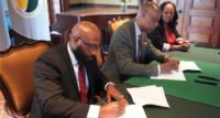 From left: Rashon Hasan, superintendent, Plainfield Public Schools; James Crawford III, then president, Felician University; and Commissioner Hanae Wyatt, president of the Plainfield Board of Education, sign a Memorandum of Understanding in March 2023 encouraging high school students and employees of the Plainfield Public School District and City of Plainfield to enroll at Felician. - FELICIAN UNIVERSITY