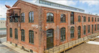 Building 110 at the Roebling Center in Trenton was the former carpentry shop for the John A. Roebling Son's Co. Trenton wireworks. - JLL