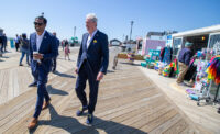 Sen. Vin Gopal, D-11th District, and Gov. Phil Murphy visit local businesses along the Asbury Park boardwalk May 25, 2023, to highlight a proposed investment of $100 million toward the Boardwalk Fund.