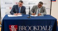 Kean University will begin offering courses on the main campus of Brookdale Community College in Lincroft beginning in fall 2023 under an agreement signed by Brookdale President David Stout and Kean University President Lamont Repollet.