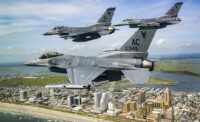Three U.S. Air Force F-16C Fighting Falcons, from the New Jersey Air National Guard's 177th Fighter Wing, fly in formation over the Atlantic City boardwalk during the 2019 Atlantic City Airshow.
