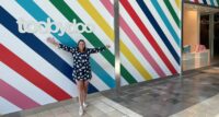 Sonja Lips, the founder of Toobydoo, poses outside of the new store at Westfield Garden State Plaza.