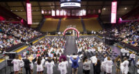 Incoming Rutgers Robert Wood Johnson Medical School students don their white coats for the first time during the school's White Coat Ceremony.