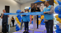 Longtime associates cut the ribbon to celebrate Walmart's newly remodeled Supercenter in Secaucus. - WALMART