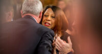 Gov. Phil Murphy and Lt. Gov. Sheila Oliver greet each other at the 2020 State of the State address in Trenton on Jan. 14, 2020.