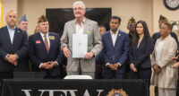 At the Veterans of Foreign Wars Harold Daley Post 1333 in Neptune City on Aug. 25, 2023, Gov. Phil Murphy signed a law making it a violation of the Consumer Fraud Act for individuals to receive compensation for advising or assisting with veterans benefits.