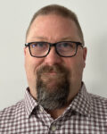 Josh Ballard, plant manager for AeroFarms' commercial indoor vertical farm in Danville, Va.