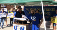 Judy Danella, a nurse at Robert Wood Johnson University Hospital who has been a part of the negotiations with facility administration, speaks during the Sept. 5 nurses strike press conference and rally.