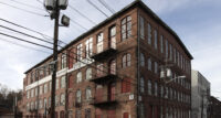 The Art Factory, located at 70 Spruce St. in Paterson, is a 230,000-square-foot industrial property. - CUSHMAN & WAKEFIELD
