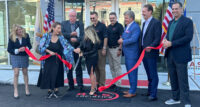 Woodmont Industrial Partners and officials including Mayor John McCormac, celebrate the opening of 51 New Brunswick Ave. in Woodbridge, which R.A.S. Logistics has signed on to lease. - WOODMONT INDUSTRIAL PARTNERS