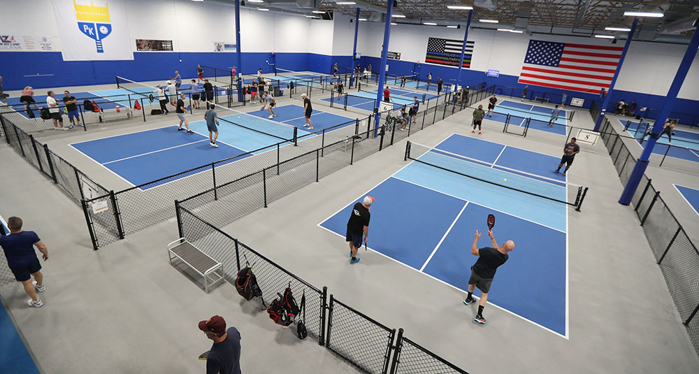 Pickleball Kingdom's state-of-the-art indoor courts allow players to enjoy pickleball year-round.