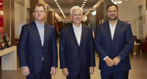 From left: Cooper University Health Care Co-CEO Kevin O'Dowd; George Norcross, chair of Cooper's board of trustees; and Co-CEO Dr. Anthony Mazzarelli attend the ribbon cutting for the new Cooper Moorestown Campus.
