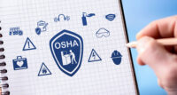 Photo of hand drawing osha concept on a notepad. - DEPOSIT PHOTOS