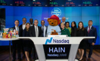 Hain Celestial Group rang the closing bell at the Nasdaq Stock Market on Jan. 4. From left: Seth Weis, Steve Golliher, Jen Davis, Curtiss Bruce, Lee Boyce, Ari Labell, Sleepytime Bear, Wendy Davidson, Ken Thomas, Amber Jefferson, Arlene Karan, Kristy Meringolo and Wolfgang Goldenitsch.
