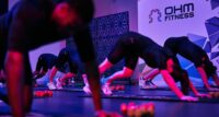OHM Fitness offers group exercise classes that utilize electrical muscle stimulation (EMS) – a U.S. Food and Drug Administration-approved wearable technology that packs the benefits of a two-hour workout into a low-impact 25-minute session.