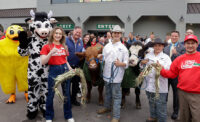 Dozens of Stew Leonard’s staff toasted the opening of the new Clifton store with milk and live cows. - PROVIDED BY PRINCETONSC