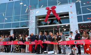 Officials celebrate the new $283.8 million Perth Amboy High School, an approximately 576,000-square-foot, three-story facility designed to educate a maximum of 3,300 students in ninth to 12th grades.
