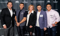 Kathy Anderson, center, poses with some of the Progress Capital team - PROVIDED BY PROGRESS CAPITAL
