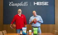 Harris Blitzer Sports & Entertainment and Campbell Soup Co. announced a new marketing partnership spanning four sports franchises. Shown from left are Campbell’s President and CEO Mark Clouse and HBSE CEO Tad Brown.