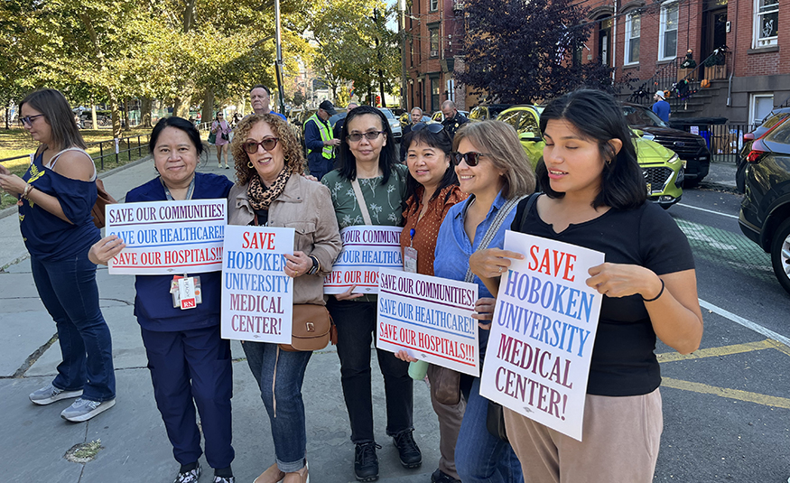 Health care workers rally in Hoboken on Oct. 22 amid increasing financial stress and potential layoffs at CarePoint Health.