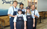 Best Buddies International founder and CEO Anthony Shriver (back left) joins Jersey Mike's Subs founder & CEO Peter Cancro (back right) and Best Buddies participants.