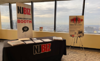 The NJBIZ exhibit booth at the 2024 Newark Summit. - JESSICA PERRY/NJBIZ