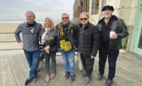Light of Day WinterFest 2025 takes place in January throughout Asbury Park, Red Bank and Montclair. The organization that raises awareness and funding to end Parkinson's Disease, ALS and PSP is now in its 25th year. From left: Light of Day Foundation board of directors members Rob Dye, Jean Mikle, Joe D'Urso and Tony Pallagrosi are joined by musician Joe Grushecky on the Asbury Park boardwalk. PHOTO: SAMMY STEINLIGHT