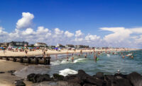 Beachgoers enjoy a hot summer day in Belmar.